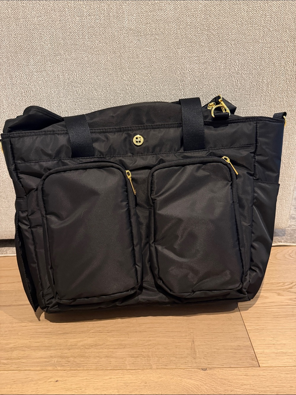 Classic Black Quilted Baby Tote with Front Zip Pockets